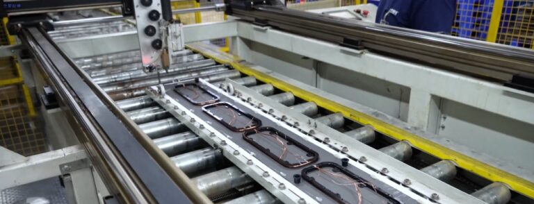 robot wraps copper wire onto panels of metal detector